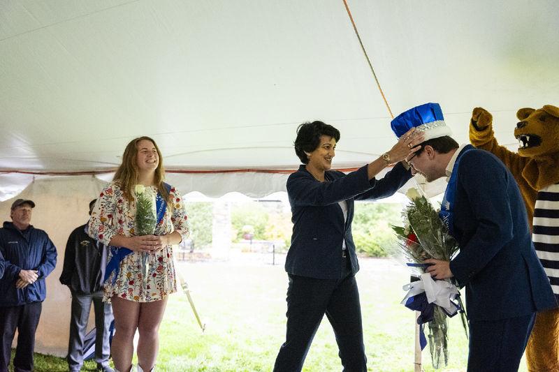 Chancellor Pyati crowns a student on stage